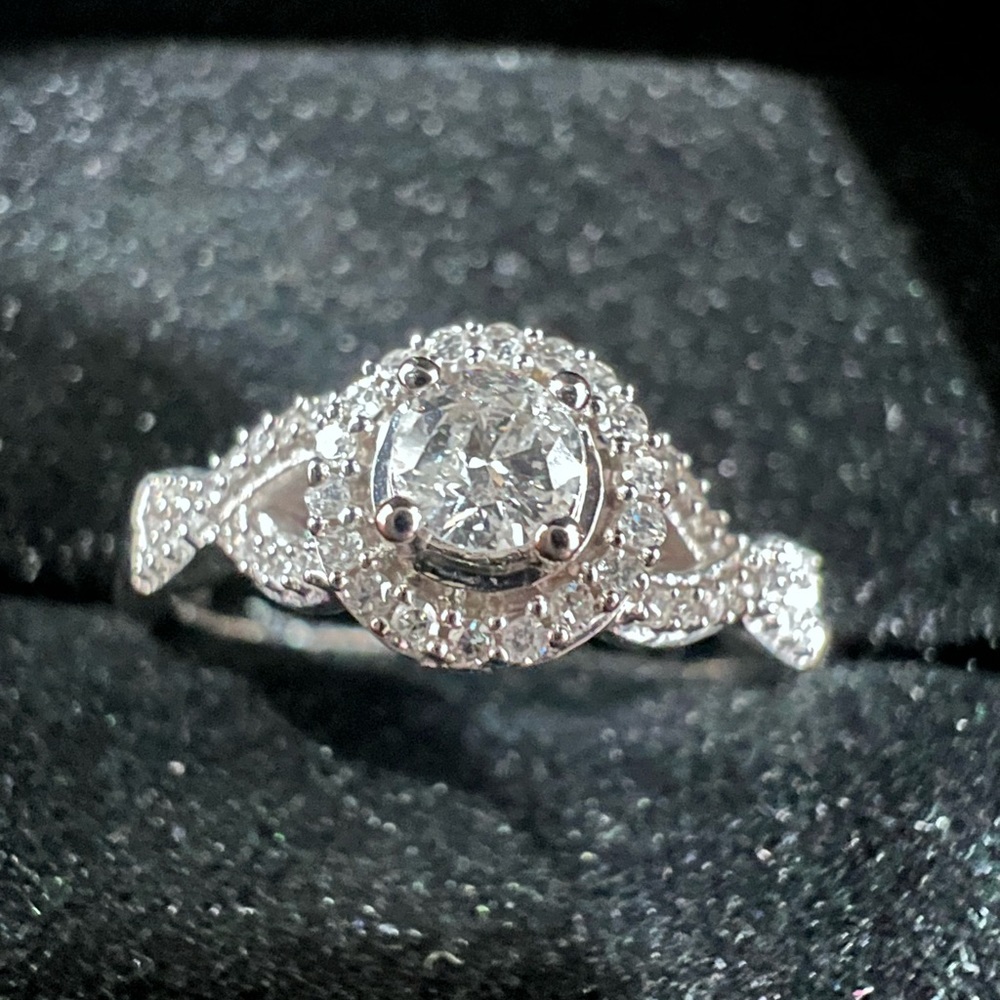 1/5 CT. T.W. Diamond Frame Twist Shank Promise Ring in 10K White Gold